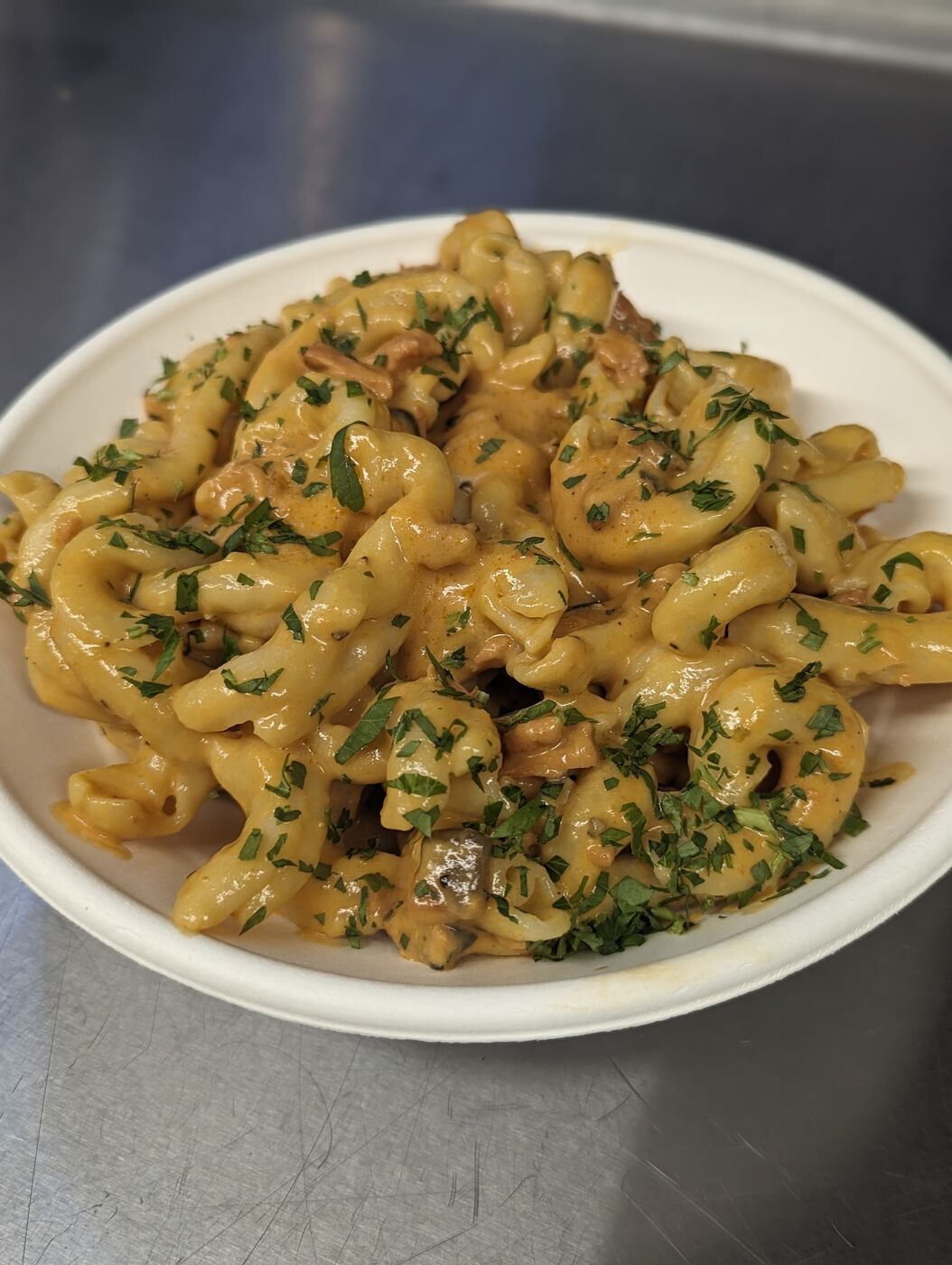 Casarecce with ragù and parsley